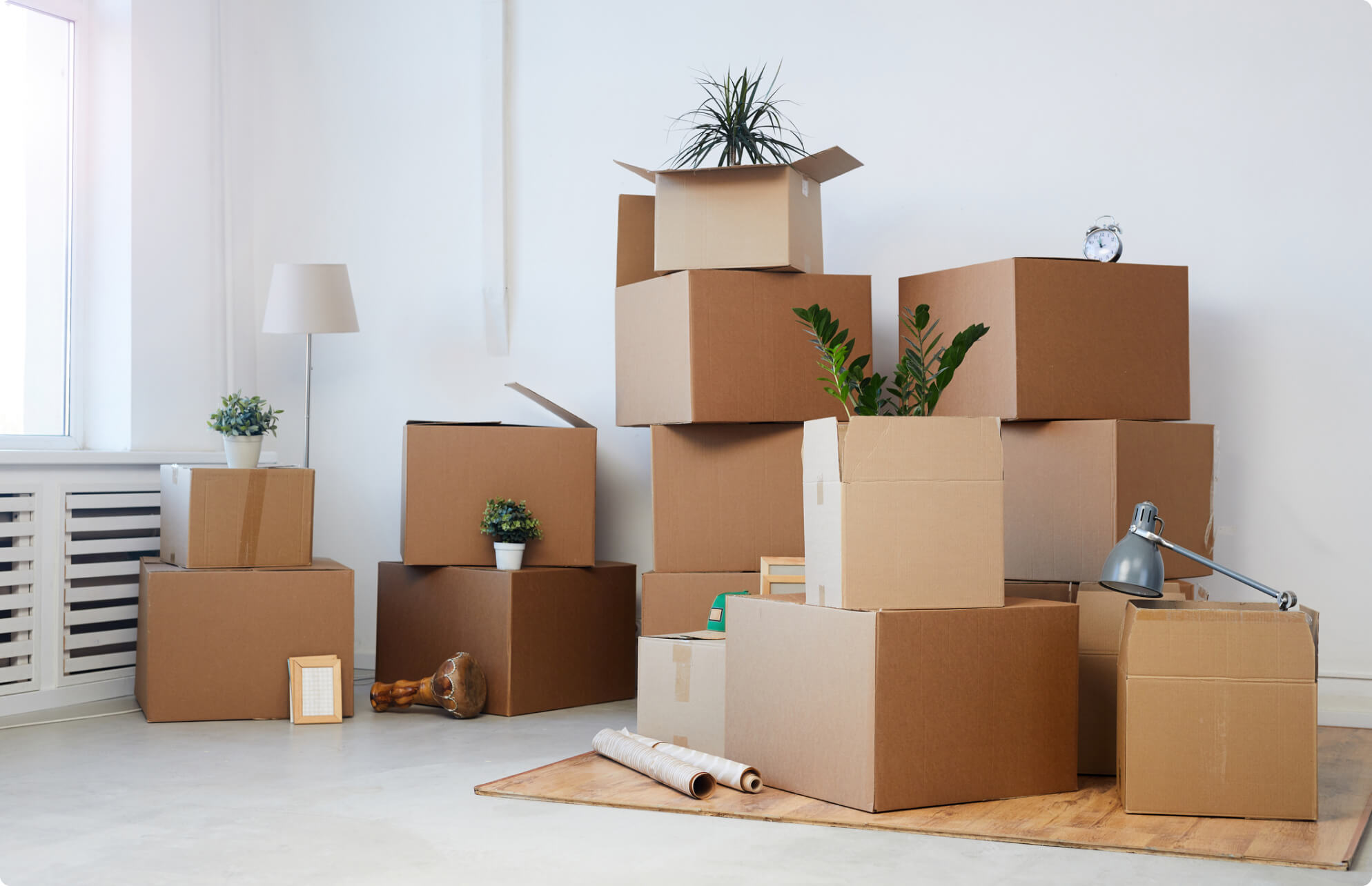 A number of cardboard boxes in a room